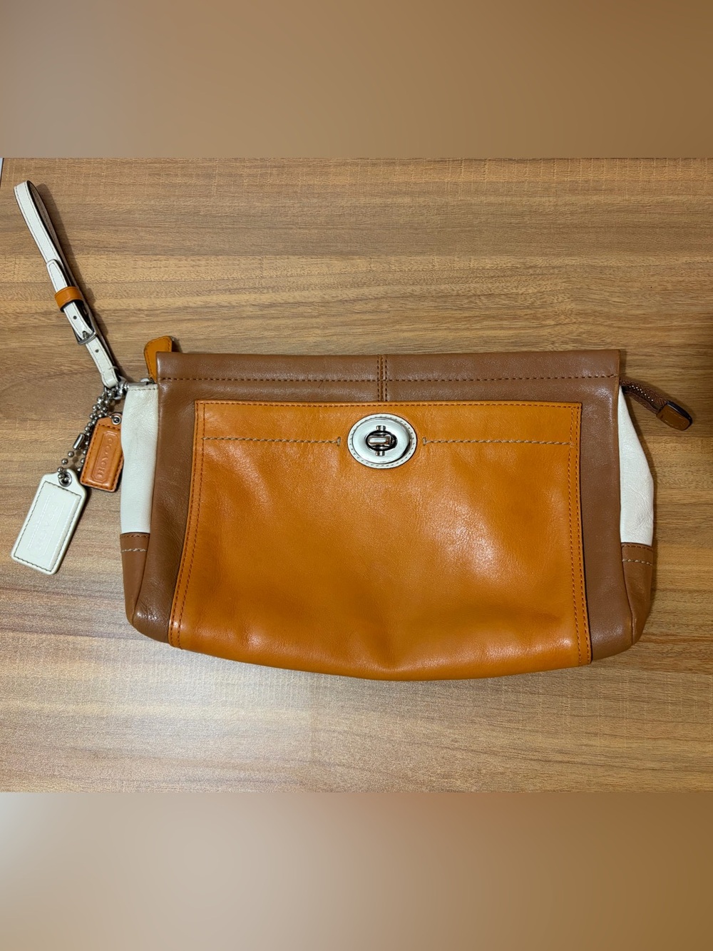 Coach Leather Turn-Lock Wristlet in Tan, Brown & Cream